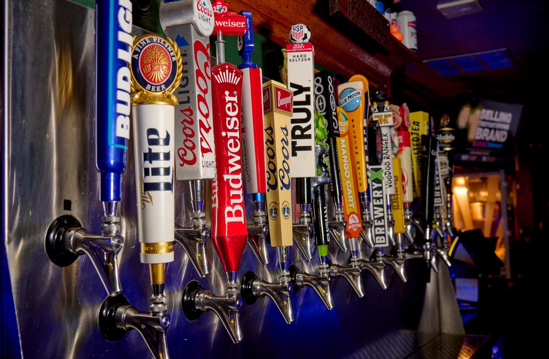 Row of draft beer taps at Harvey's Sports Bar